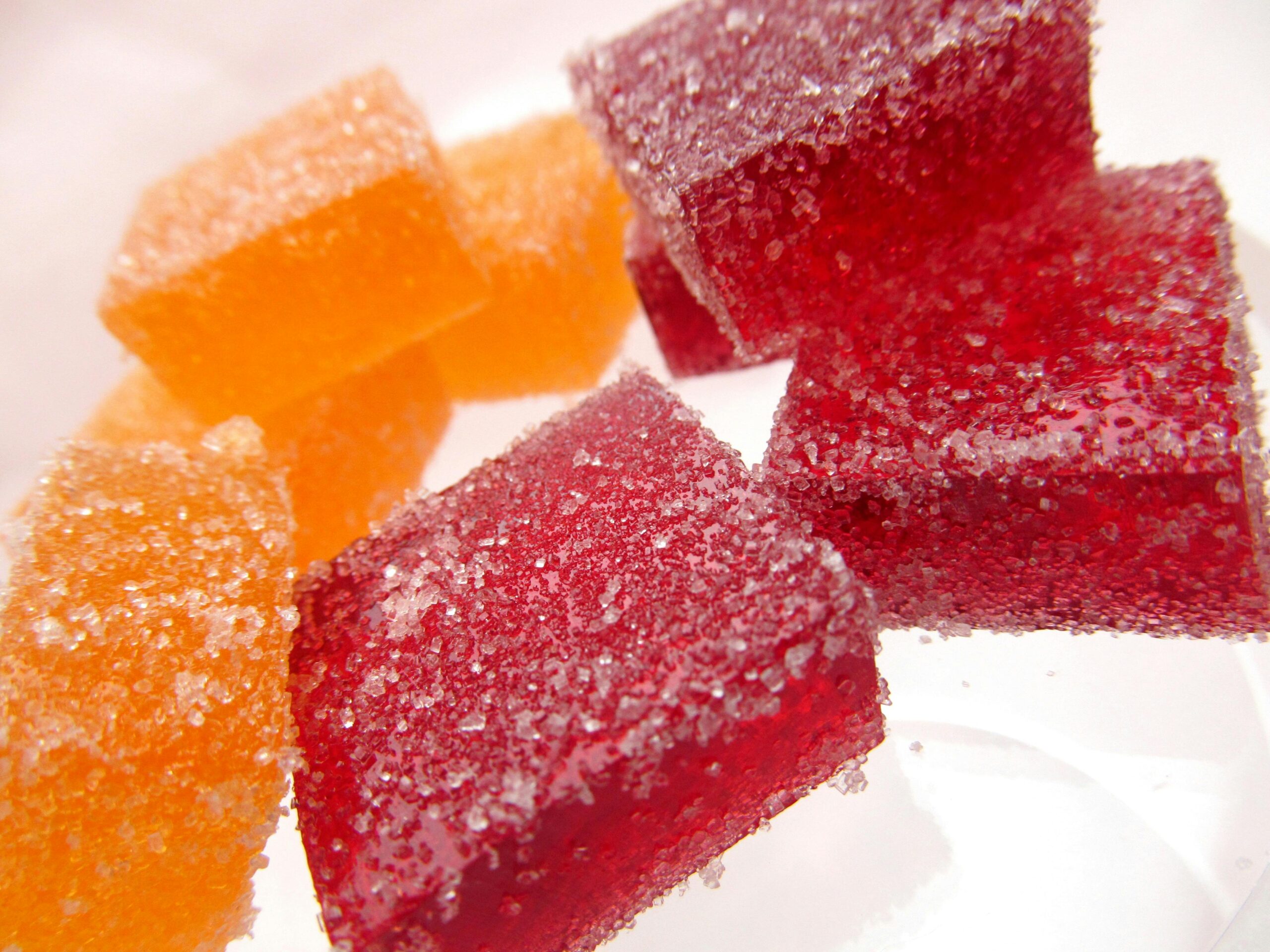 Close of of orange and red cannabis gummies